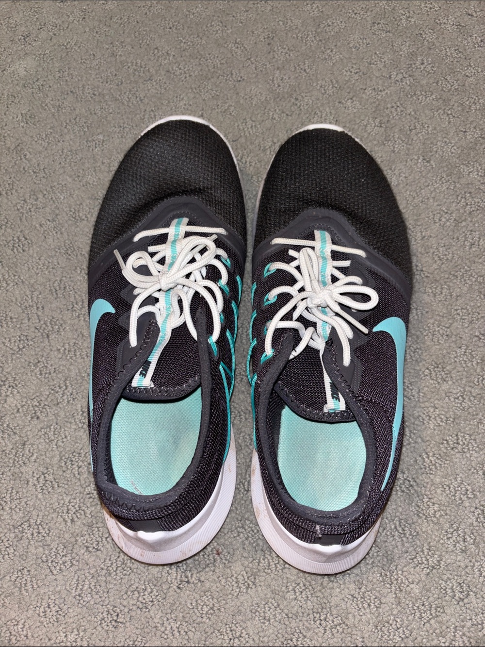 Nike Women’s Black Athletic Shoes with Teal Accents